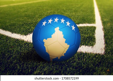 Kosovo flag on ball at corner kick position, soccer field background. National football theme on green grass. - Powered by Shutterstock