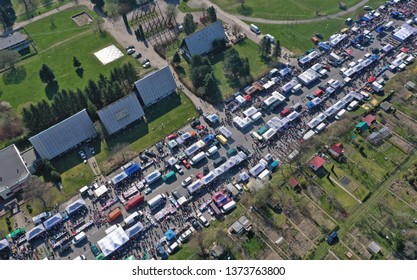 KOSZALIN, POLAND - 07 APRIL 2019 - Aerial view on Koszalin's Gielda miscellaneous sunday market filled with crowds of buyers and seller's makeshift stands.