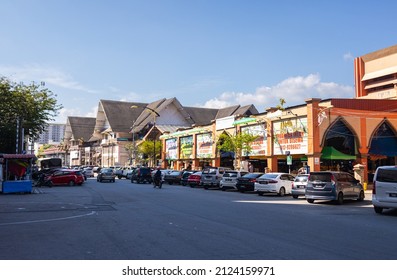 Kota Bahru, Malaysia - January 26, 2022: Cityscape Or Street View Of The Malaysian City Of Kota Bahru Near The Thailand Border. Cars Parking On The Road Side At The Central Market. 