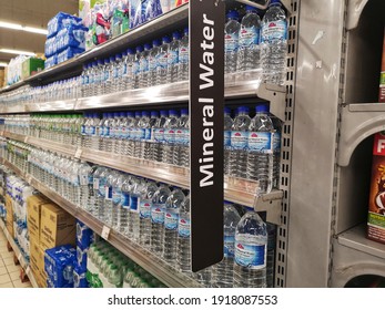 Kota Kemuning, Malaysia - 7 February 2021 : Mineral Water Section Display For Sell In The Supermarket With Selective Focus.

