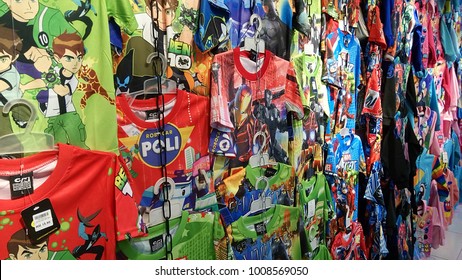 Kota Kinabalu, Malaysia - October 21, 2017: Various Kids T-shirts With Marvel Super Heroes, Avengers, Ironman, Captain America And Ben 10 Prints Are Displayed For Customers To Choose At Shopping Mall