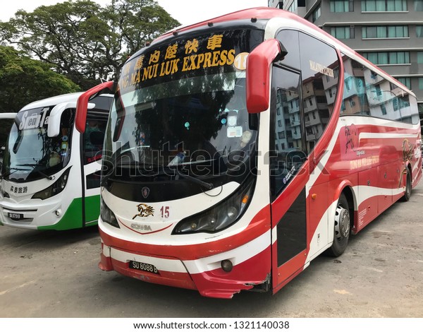 Kota kinabalu sabah 6 feb 2018 . Bus\
park at bus station while waiting their customer. Bus helping the\
people to reach their destination with small fee.\
