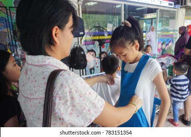 Kota Kinabalu Sabah Malaysia - Dec 29, 2017 : Parents Buying School Uniform As Preparation For 2018 School Session In Kota Kinabalu Sabah.