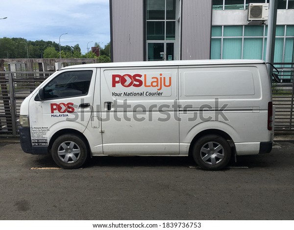 Kota Kinabalu, Sabah, Malaysia, Oct 24, 2020:\
Poslaju Courier van park at a parking lot. Pos Laju is the leading\
courier company in Malaysia, connecting over 80% of populated areas\
across the country