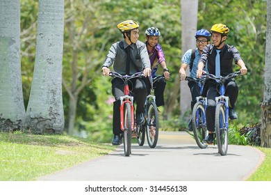 Kota Kinabalu Sabah Malaysia - Sep 11, 2014:A Group Of Unidentified University Student Cycling To Attend Class.Most University In Malaysia Encourge Student To Opt Cycling In Their Campus Activity.