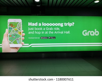 Kota Kinabalu Sabah Malaysia - Sept 14, 2018: Grab services on mobile phone. Many Malaysian youth are attracted to join the ride sharing services business of Grab and MyCar.