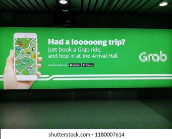 Kota Kinabalu Sabah Malaysia - Sept 14, 2018: Grab services on mobile phone. Many Malaysian youth are attracted to join the ride sharing services business of Grab and MyCar.