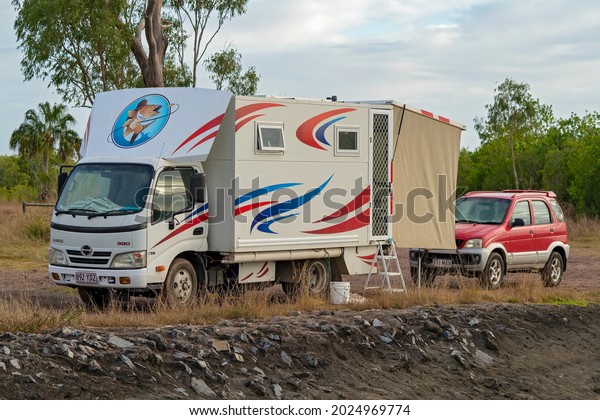 Koumala, Queensland,\
Australia - August 2021: A motor home parked up in the bush\
enjoying the free\
camping