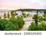 Kouvola, Finland. City centre with buildings, streets and trees. Beautiful cityscape of a Finnish town. Day or evening sunset in summer. Aerial panorama view. Travel and tourism in Kymenlaakso.