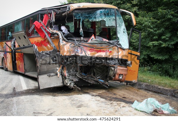 KOVEL, UKRAINE - JULY 11: Scene of bus crash
where nine Ukrainian, Belarusian and Bulgarian Tourists were died
and as many as 30 others were injured July 11, 2013 just outside
Kovel, Ukraine.