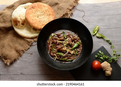 Koyla Karahi With Garlic Naan