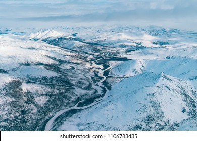 Koyukuk River in Alaska's Arctic National Wildlife Refuge from Bush Plane during Winter - Shutterstock ID 1106783435