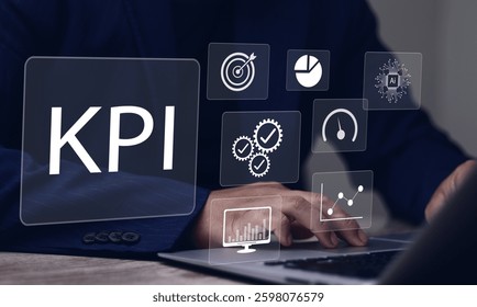 KPI, Analyzing Key Performance Indicators. Businessman use laptop to analyze key performance indicators (KPIs) with various graphs, work tools, charts, data analysis, and performance tracking.