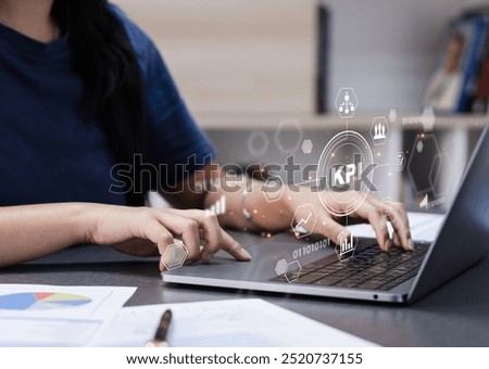 KPI, Analyzing Key Performance Indicators. Businessman using laptop to analyze key performance indicators (KPIs) displayed as holographic icons. operations, sales.