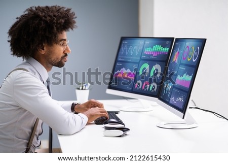 KPI Business Analytics Data Dashboard. Analyst Using Computer