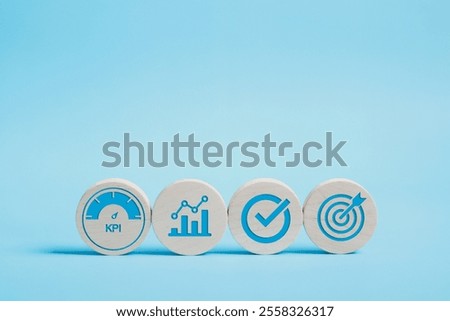 KPI, business performance indicators, Data management system icon on wooden block to make report with KPI, metrics connected to database. finance, operations, sales, marketing.
