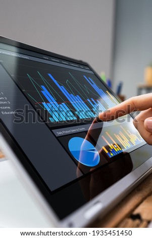 KPI Dashboard Data Charts On Hybrid Tablet
