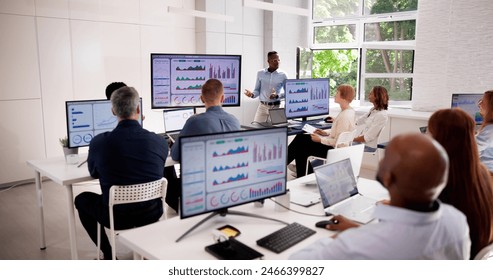 KPI Dashboard Graph Presentation In Classroom. Business Training - Powered by Shutterstock