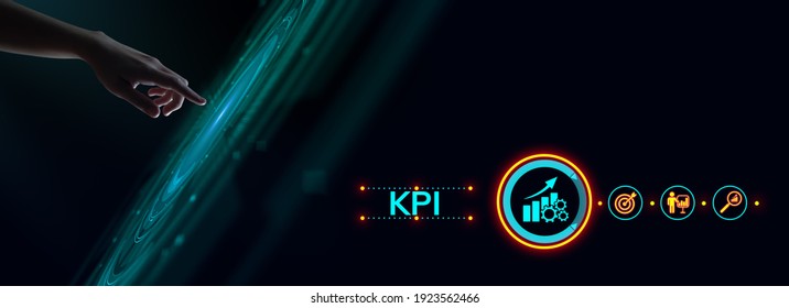 KPI Key Performance Indicator. Hand pressing button on screen.
