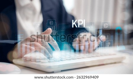 KPI performance dashboard on digital interface with business data metrics and analytics. Manager typing on keyboard to monitor key indicators, tracking growth, goals, and productivity in real-time.