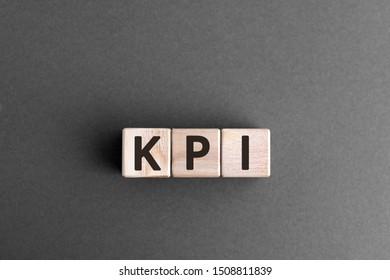 KPI - Wooden Blocks With Letters, Key Performance Indicator KPI Concept,  Top View On Grey Background