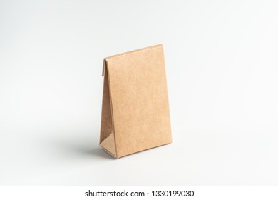 Kraft Cardboard Box On A White Background, Moke Up