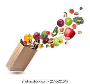 Kraft paper bag with different fruits and vegetables on white background - Shutterstock ID 2148621345