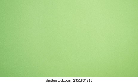 Kraft paper bright green mint colour background.
Cardboard craft color lime texture.
top view. स्टॉक फोटो
