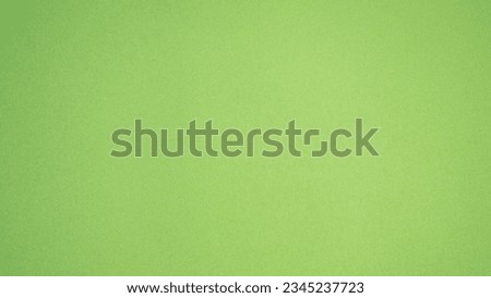 Kraft paper bright green mint colour background.
Cardboard craft color lime texture.
top view.