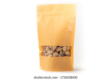 Kraft Paper Doypack Pouch Flexible Packaging With Window Zipper On White Background Filled With Pistachios