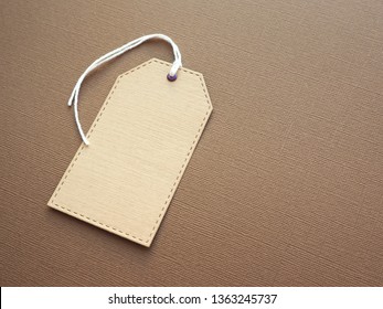 Download Kraft Paper Label Mockup On Brown Backgrounds Textures Stock Image 1363245737 PSD Mockup Templates