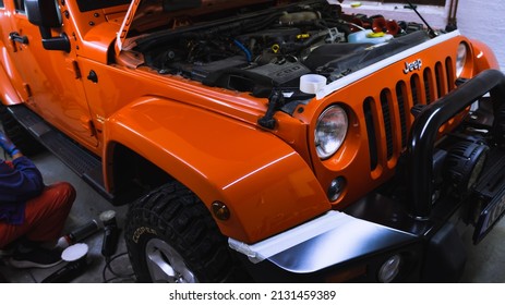 Kragujevac, Serbia. 28.09.2021. Indoor Photoshoot,orange Jeep In Selective Focus- Details And Forced Perspective.