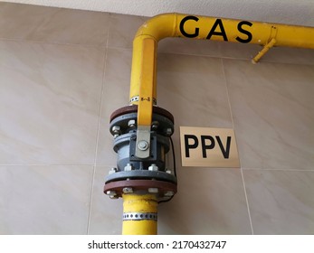 Kragujevac, Serbia, June 22, 2022 Yellow Gas Pipes With On And Off Lever, Gas Installation For Heating In A Residential Building