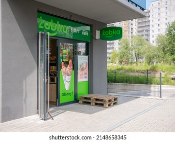 Krakow, Malopolska, Poland - May 2022: Krakow, Poland, Zabka Convenience Store Entrance, Facade, Front, Open Doors, Nobody, No People. Popular Polish Chain Store Brand, Commerce, Food Retail