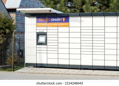 Krakow, Malopolska, Poland - May 2022: InPost Company Outdoors Parcel Locker Automated Postal Box Self Service Mail Package Collection Point Closeup, Post Package Delivery Concept, Nobody, No People