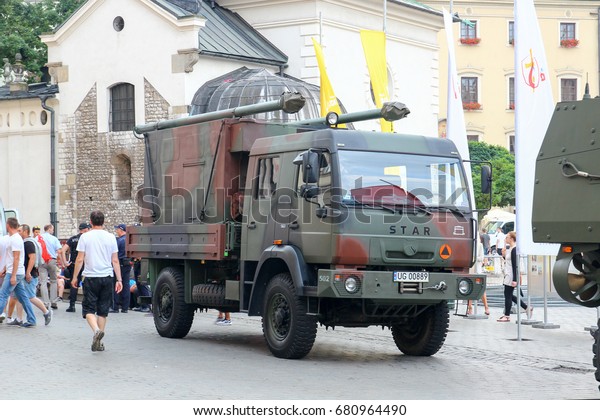 KRAKOW, POLAND -  2016: military trucks on the\
Main Square during world youth\
day