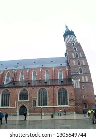 Krakow, Poland - 29.03.18: Side View Of St. Mary's Basilica - Our Lady Assumed Into Heaven - Brick Church,one Of The Best Examples Of Polish Gothic Architecture, And Commonly Noted In Top 10 Churches.