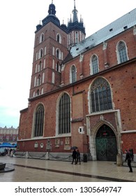 Krakow, Poland - 29.03.18: Side View Of St. Mary's Basilica - Our Lady Assumed Into Heaven - Brick Church,one Of The Best Examples Of Polish Gothic Architecture, And Commonly Noted In Top 10 Churches.