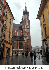 Krakow, Poland - 29.03.18: Side View Of St. Mary's Basilica - Our Lady Assumed Into Heaven - Brick Church,one Of The Best Examples Of Polish Gothic Architecture, And Commonly Noted In Top 10 Churches.