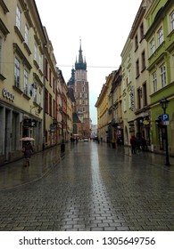 Krakow, Poland - 29.03.18: Side View Of St. Mary's Basilica - Our Lady Assumed Into Heaven - Brick Church,one Of The Best Examples Of Polish Gothic Architecture, And Commonly Noted In Top 10 Churches.