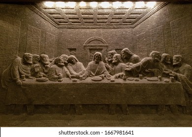 Krakow, Poland - 7 Nov, 2019: The Last Supper Sculpture Carved From Rock Salt In St Kinga's Chapel Of Wieliczka Salt Mine