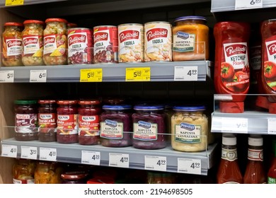 Krakow, Poland - April 2022: Krakow, Poland, Food Products, Necessities, Zabka Store Shelves Detail Shot, Group Of Objects On A Shelf, Price Tags Closeup, No People. Food Retail Business Concept