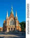 Krakow, Poland. Church Saint Joseph - a historic Roman Catholic church in Gothic Revival (neo-Gothic) style at the Podgorski Square in Podgorze district in Cracow in sunset light