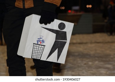 Krakow, Poland - February 12 2021: Poster With Anti Law And Justice Party Picture Hold By Protester During Public Demonstration 