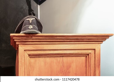 Krakow, Poland - June 3, 2018: Schutzstaffel  (SS) Skull Division Hat Sits On Display In Oskar Schindler's Enamel Factory Museum