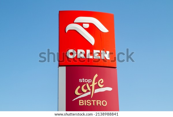 KRAKOW, POLAND - MARCH 21, 2022: Orlen and Stop
Cafe Bistro sign outside a petrol station. Logo at filling gas
station forecourt
pylon.