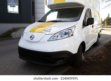 KRAKOW, POLAND - MARCH 27, 2022: Nissan E-NV200 Car, Electric Delivery Truck. Zero-emission Cargo Van In InPost Fleet - Logistics Courier Company And Mail, Package Service.