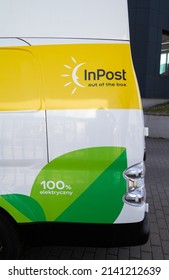 KRAKOW, POLAND - MARCH 27, 2022: InPost Logo On The Side Of Nissan E-NV200 Car, Electric Delivery Truck. Zero-emission Cargo EV Van Fleet - Logistics Courier Company And Mail, Package Service.