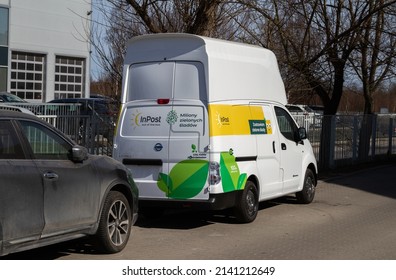 KRAKOW, POLAND - MARCH 27, 2022: Nissan E-NV200 Car, Electric Delivery Truck. Zero-emission EV Cargo Van In InPost Fleet - Logistics Courier Company And Mail, Package Service.