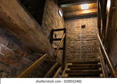 KRAKOW, POLAND - MAY 29, 2016: Old Wooden Staircase In The Tower Of St. Mary's Basilica. The Church Was Built In The 14th Century And Serve As One Of The Best Examples Of Polish Gothic Architecture.